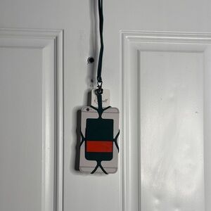 Green and Red Orange Phone Holder
